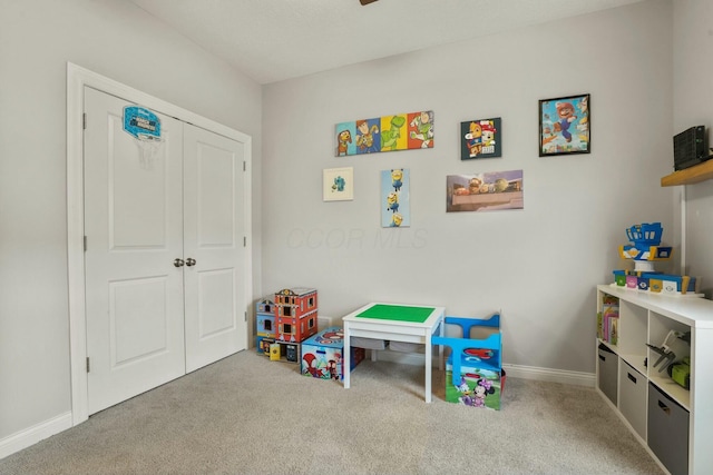 playroom featuring light carpet