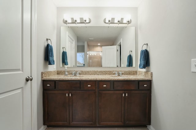 bathroom with an enclosed shower and vanity