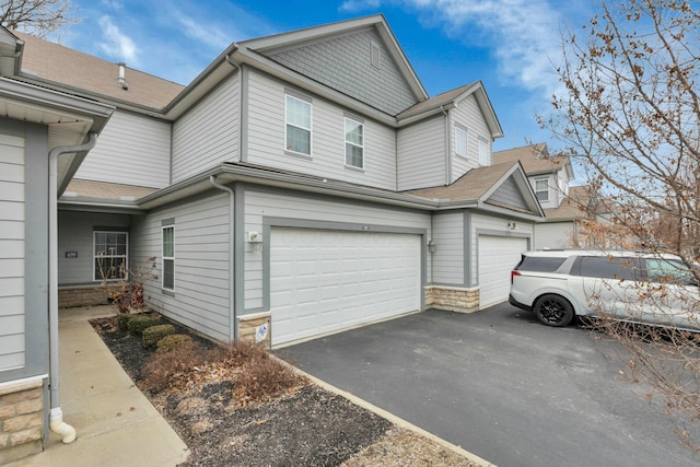 view of side of property featuring a garage