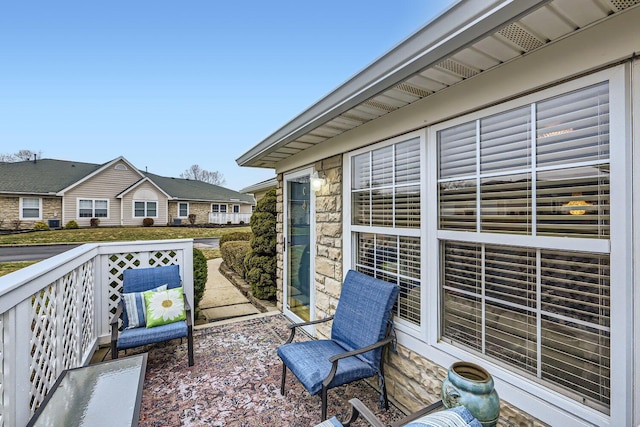 wooden balcony featuring a wooden deck