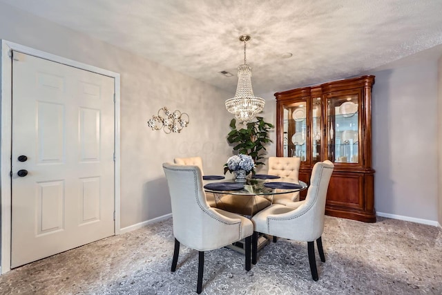 dining area with a chandelier