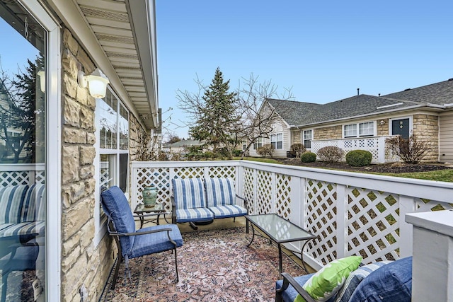 wooden balcony featuring a wooden deck