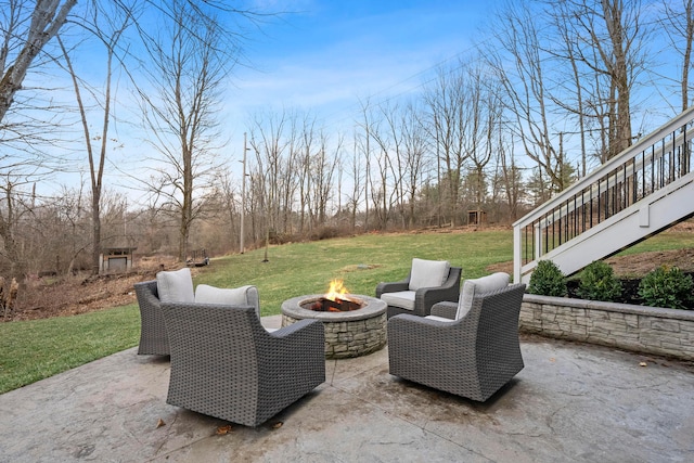 view of patio featuring an outdoor fire pit