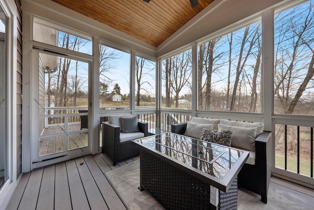 sunroom / solarium featuring wooden ceiling