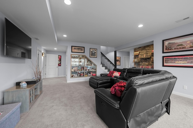 living room with visible vents, light colored carpet, stairway, and recessed lighting