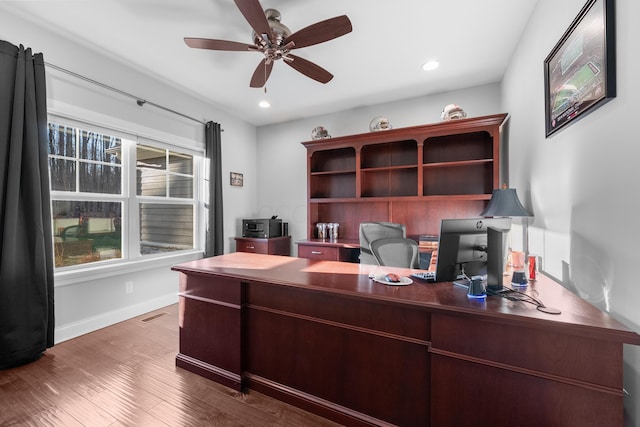 home office featuring recessed lighting, visible vents, a ceiling fan, wood finished floors, and baseboards