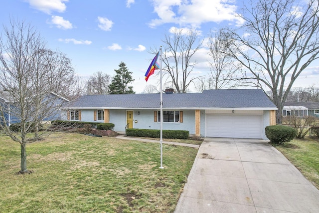 ranch-style home with a garage and a front yard