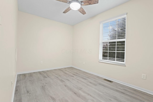 unfurnished room with ceiling fan and light hardwood / wood-style floors