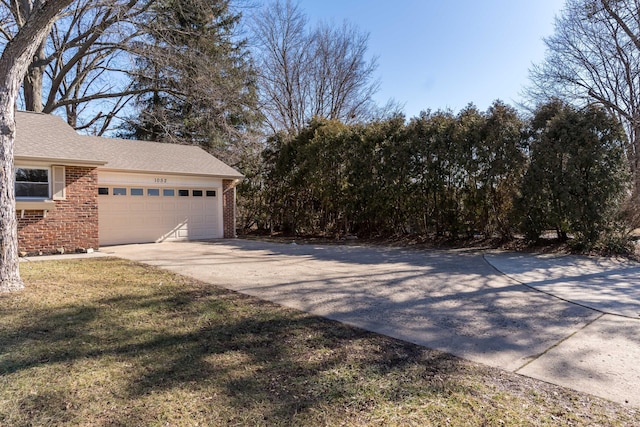 garage with a lawn