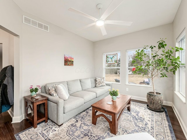 living room with hardwood / wood-style flooring, plenty of natural light, and ceiling fan