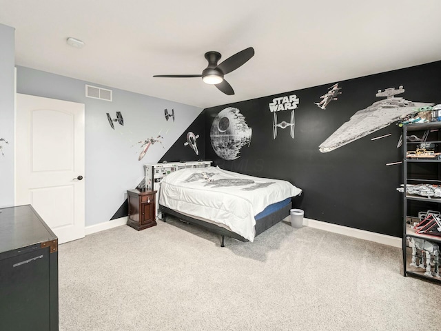 bedroom with carpet, lofted ceiling, and ceiling fan