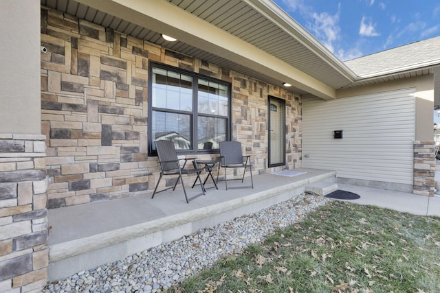 view of patio featuring a porch