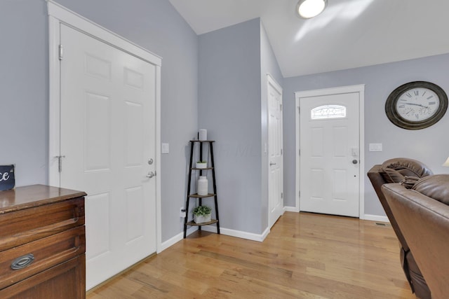 entryway with light hardwood / wood-style flooring