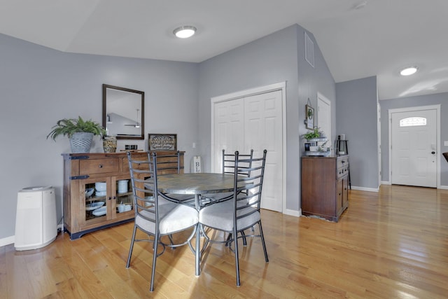 dining area featuring light wood-type flooring