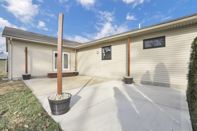 back of property with a patio area