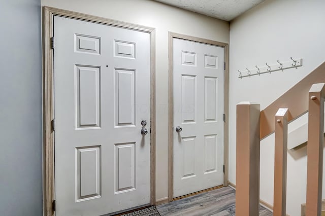 doorway to outside featuring light hardwood / wood-style floors