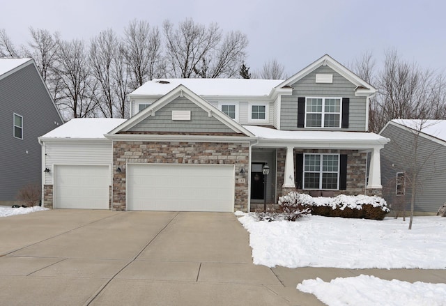 craftsman inspired home with a garage