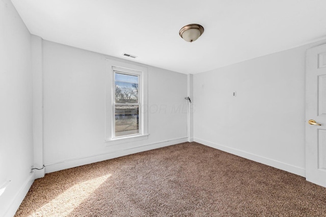 spare room with carpet