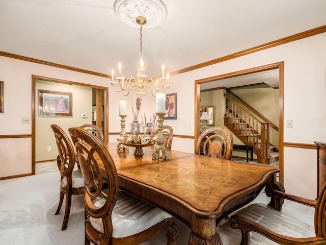 carpeted dining room featuring crown molding, stairway, baseboards, and an inviting chandelier