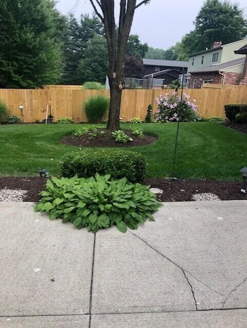 view of yard with fence