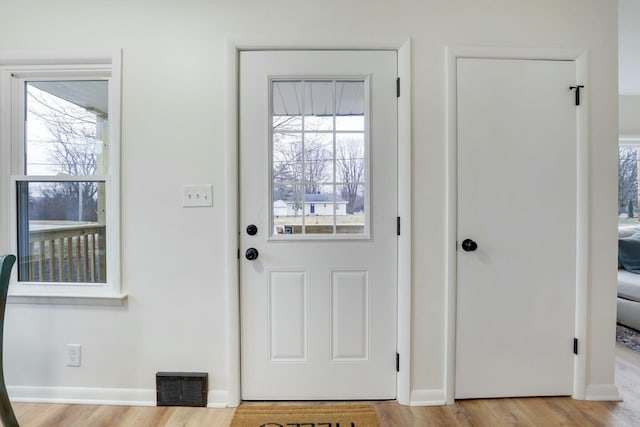 interior space with light hardwood / wood-style floors