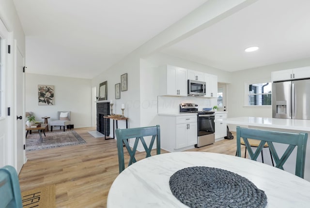 dining area featuring light hardwood / wood-style floors