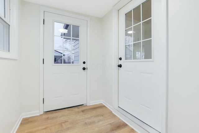 doorway featuring light hardwood / wood-style floors