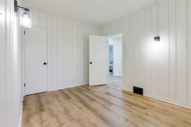 unfurnished room featuring light wood-type flooring