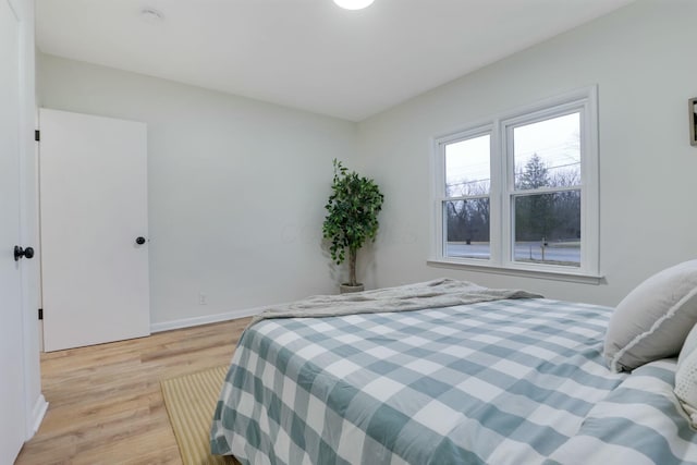 bedroom with light wood-type flooring