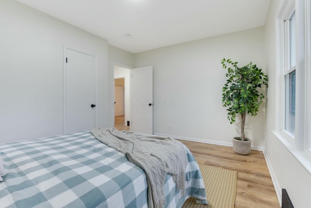 bedroom featuring light wood-type flooring