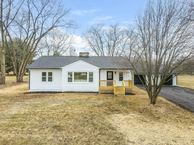 ranch-style home featuring a front yard