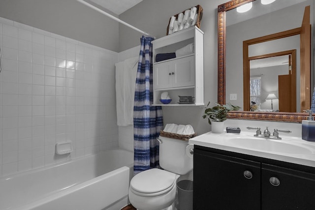 full bathroom featuring shower / bathtub combination with curtain, vanity, and toilet