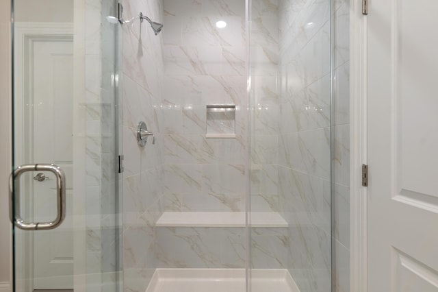 bathroom featuring walk in shower
