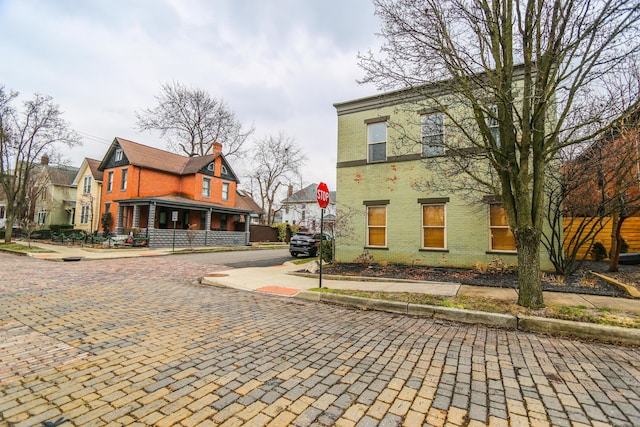 exterior space with brick siding