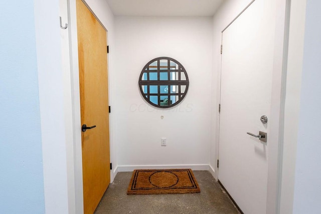260 King St, Yellow Springs, OH 45387 - entryway with baseboards and finished concrete floors