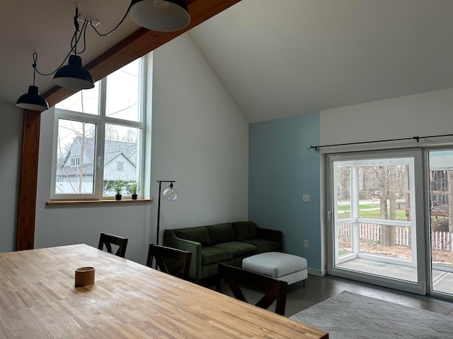 260 King St, Yellow Springs, OH 45387 - dining room featuring vaulted ceiling with beams and finished concrete floors