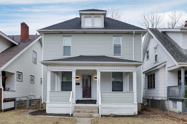 view of front of property featuring covered porch