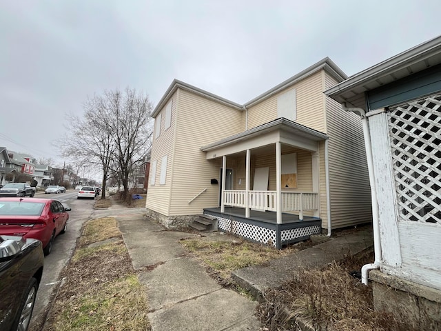 view of home's exterior featuring a porch