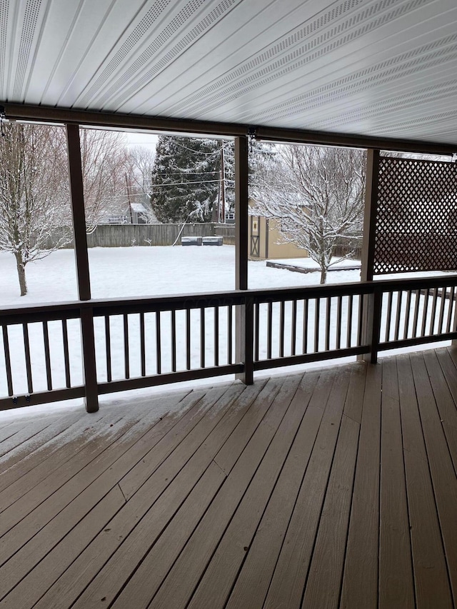 view of snow covered deck