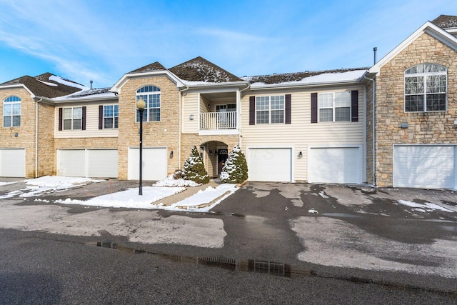 multi unit property featuring a balcony