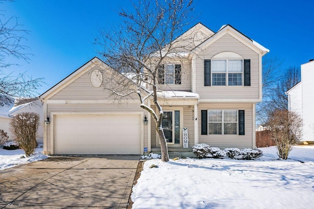 view of front of home with a garage