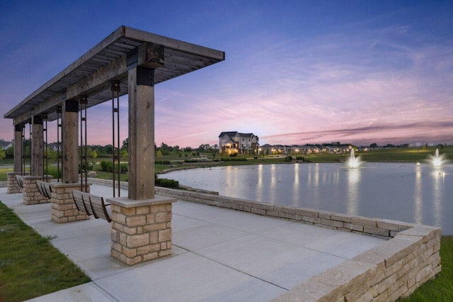 exterior space with a water view