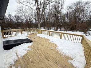 view of snow covered deck