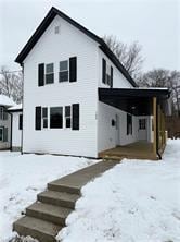 view of snow covered property