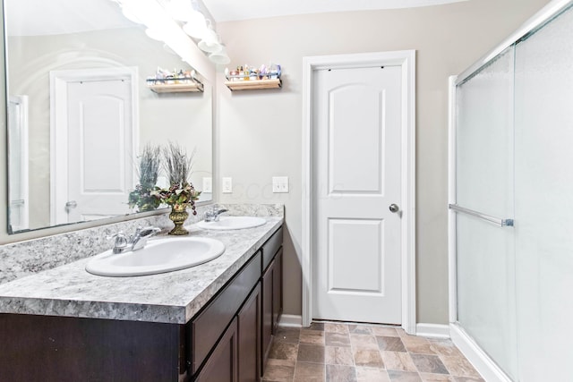 bathroom with vanity and walk in shower