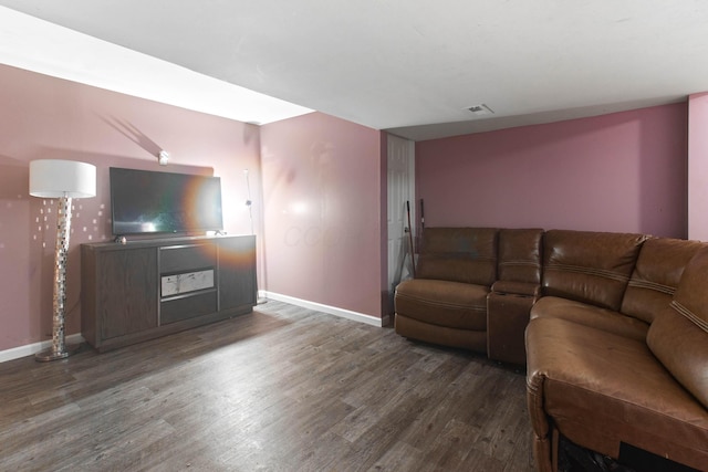 living room with dark wood-type flooring