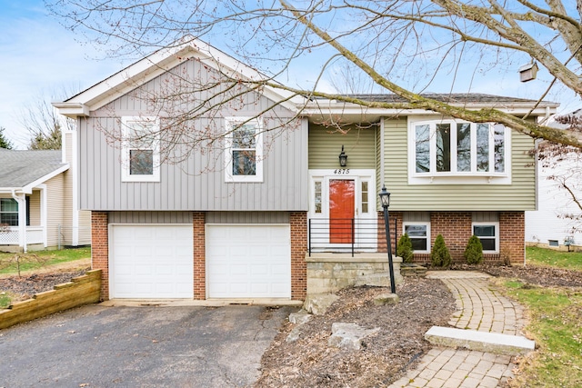 bi-level home featuring a garage