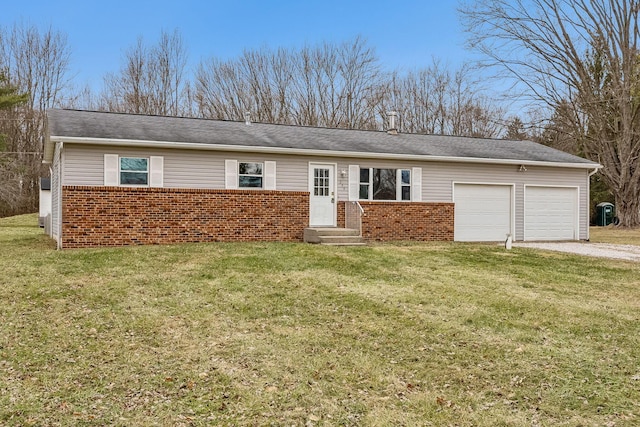 single story home with a garage and a front yard