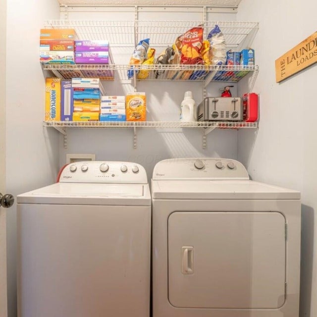 laundry area with washer and dryer