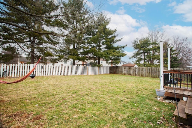 view of yard with a deck